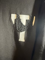 Tenaciti Studios t-shirt features a large fuzzy “T” logo on the right chest SZ S