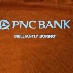 District Men’s L Orange PNC Bank “Brilliantly Boring” Logo Graphic T-Shirt